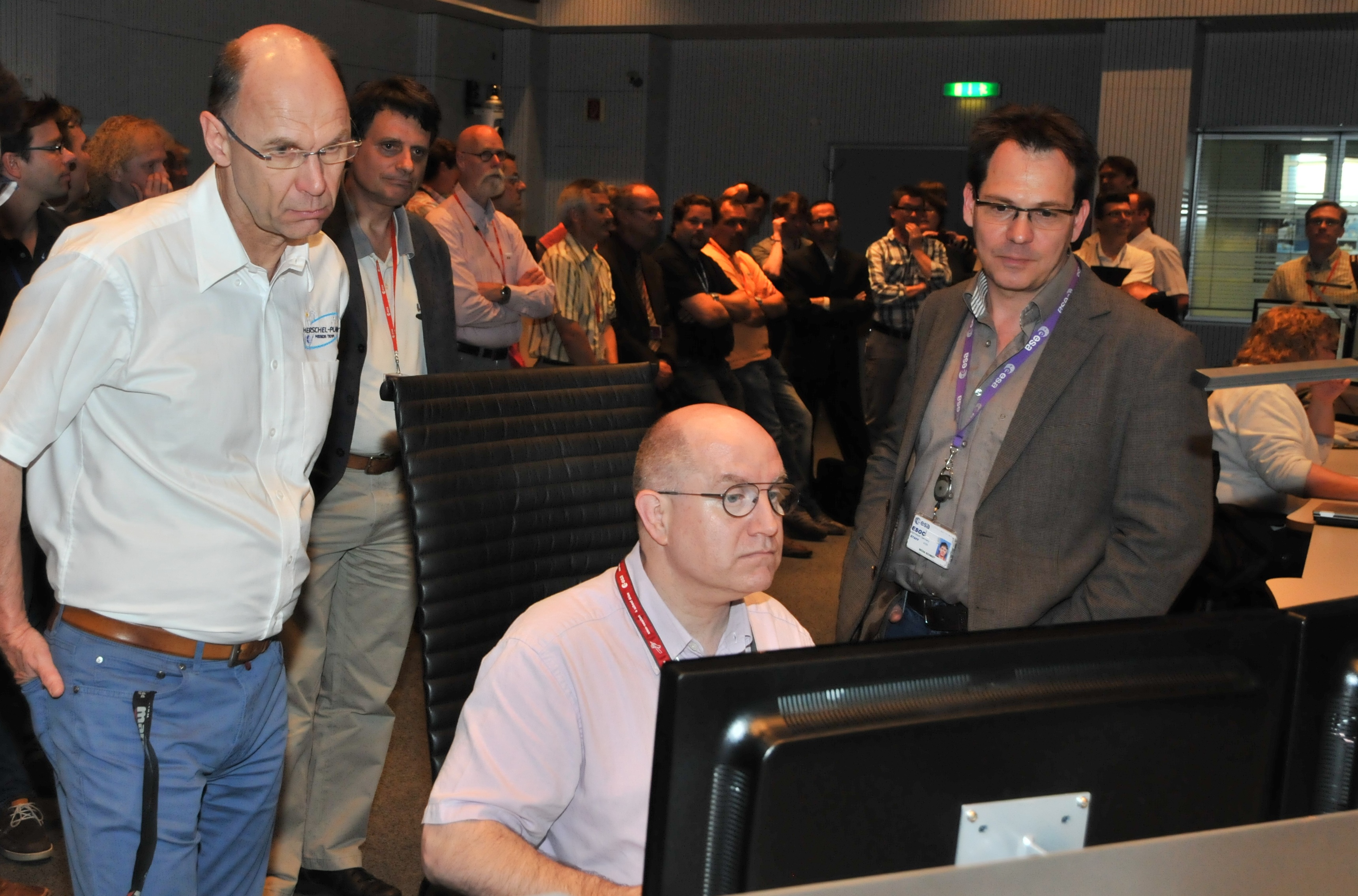 ESA's Herschel Project Scientist, Göran Pilbratt (left) and Spacecraft Operations Manager Micha Schmidt (right), watching final telemetry from Herschel in the Main Control Room at ESOC. Final command was sent at 12:25 GMT (14:25 CEST) on 17 June 2013. ESA's Herschel Project Scientist, Göran Pilbratt (left) and Spacecraft Operations Manager Micha Schmidt (right), watching final telemetry from Herschel in the Main Control Room at ESOC. Final command was sent at 12:25 GMT (14:25 CEST) on 17 June 2013.