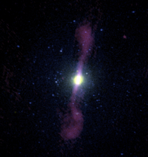 This image shows a composite view of the giant elliptical galaxy NGC 1399. Copyright: Digitised Sky Survey/NASA Chandra/Very Large Array (Robert Dunn et al. 2010)
