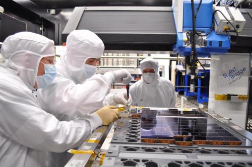 A total of 106 CCDs make up Gaia's focal plane. Technicians from Astrium France, the Gaia mission's prime contractor, are seen here carefully bolting and aligning the CCDs onto the CCD support structure (CSS), at the company's facility in Toulouse. The CSS (the grey plate underneath the CCDs, with the gaps and holes for the integration and wiring of the CCDs) weighs about 20 kg and is made of silicon carbide (SiC), a material that provides remarkable thermal and mechanical stability. Gaia's CCDs are provided by e2v Technologies of Chelmsford, UK. Each CCD measures 6cm × 4.7 cm, with a thickness of only a few tens of microns. Precisely fitted together on the CSS, the gap between adjacent CCD packages is about 1 millimetre. ***** 22 April 2011 ***** credits: Astrium
