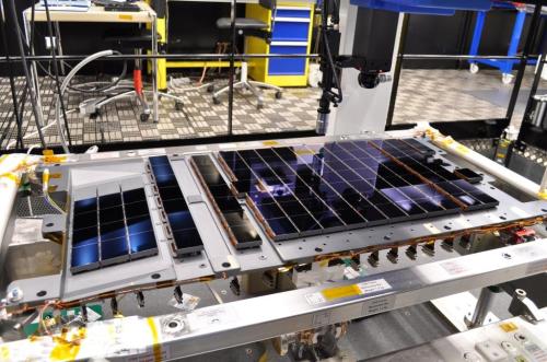This photo, taken at the Astrium France facility in Toulouse, shows the complete set of 106 CCDs that make up Gaia's focal plane. The CCDs are bolted to the CCD support structure (CSS). The CSS (the grey plate underneath the CCDs in this photo) weighs about 20 kg and is made of silicon carbide (SiC), a material that provides remarkable thermal and mechanical stability. The focal plane measures 1 m × 0.5 m. Gaia's CCDs are provided by e2v Technologies of Chelmsford, UK. Each CCD measures 6 cm × 4.7 cm, with a thickness of only a few tens of microns. Precisely fitted together on the CSS, the gap between adjacent CCD packages is about 1 millimetre. From left to right in this photo, distinct areas on the focal plane can be seen: 3 strips of 4 CCDs for the Radial Velocity Spectrometer (RVS), 1 strip of 7 CCDs for the Red Photometer, 1 strip of 7 CCDs for the Blue Photometer, 9 strips of 7 CCDs forming the Astrometric field (except for the middle CCD of the first column (slightly offset toward the Blue Photometer column), which is one of the two wave front sensors), 2 strips of 7 CCDs for the sky mapper, 1 strip with 3 CCDs: two basic angle monitors (top right), and one wave front sensor. credits: Astrium