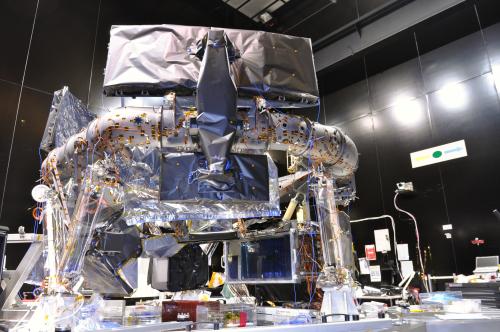 Gaia Protoflight Payload Module during integration. Some of the Multi-Layer Insulation (MLI) has yet to be installed. Nearest to the camera, the rear of one of the primary mirrors and one of the tertiary mirrors are visible, both covered with MLI. The blue wiring visible on the optical bench, or torus, connects the accelerometers needed for vibration testing, while the gold-coloured wiring connects the flight temperature sensors/heaters - which will also be used during for the thermal balance/thermal vacuum testing - to external data recorders. ***** 11 August 2012 ***** credits: Astrium SAS