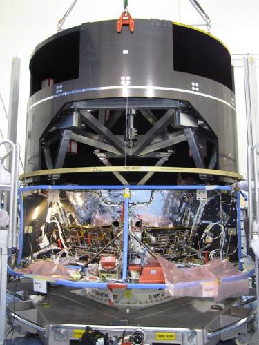 Final configuration of the fit check of the Thermal Tent Structure (TTS) Flight Model (FM) on the Service Module (SVM) Proto-Flight Model (PFM) (bottom) and dummy Payload Module (top). After addition of the Deployable-Sunshield-Assembly (DSA), this configuration was subject to spacecraft-level structural testing.  ***** 1 November 2010 ***** credits: EADS Astrium